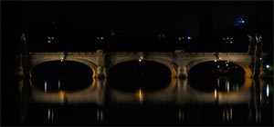 picture of an ancient bridge at night